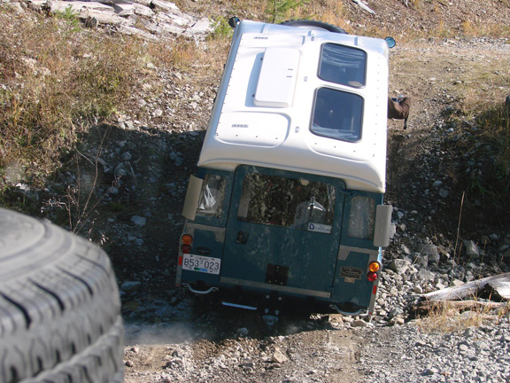 1962 Land Rover Dormobile  going down a trail